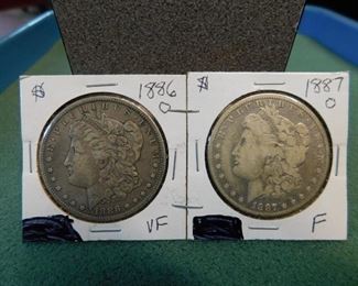 Lot 90. 1886-O,1887-O Morgan Dollars