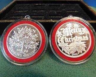 Lot 104. 2 One Ounce Silver Christmas Rounds