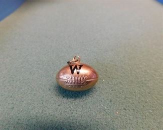 Lot 119. Old College of Wooster 10K Gold Football Pendant(6.6 Grams)