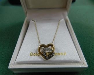 Lot 131. 10K Gold Diamond Heart Necklace