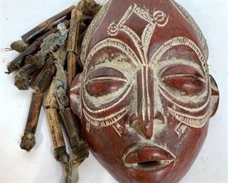 Carved Tribal Mask Sculpture
