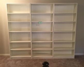 Three White Pressed Wood Bookshelves