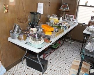 misc glassware, utensils, corning ware( some still in box) pyrex and slow cooker. 