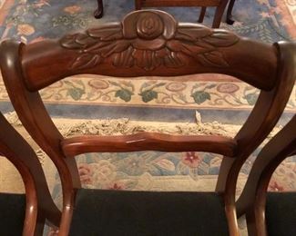 Top of needlepoint chairs