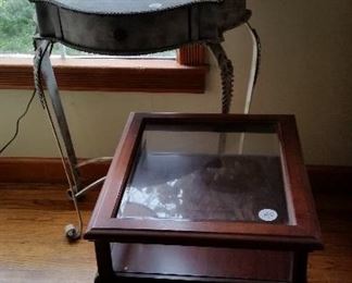 display cabinet $40, metal table by window $20