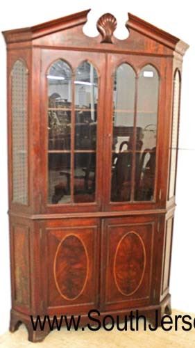   ANTIQUE Burl Mahogany Inlaid 10 Pane 4 Door Corner Cabinet

Auction Estimate $500-$1000 – Located Inside 