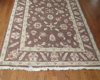 5X8 AREA RUG.