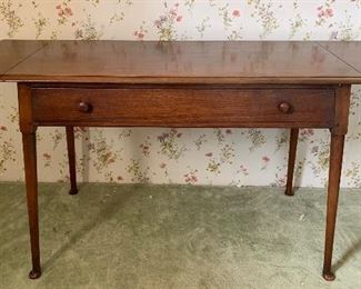 Walnut Dressing Table with Single Full Length Drawer and Overhanging drop leaf	29x58x20	HxWxD
