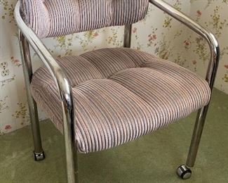 Mid Century Chair Stainless Steel with upholstered cushions on casters	32x22x20	HxWxD

