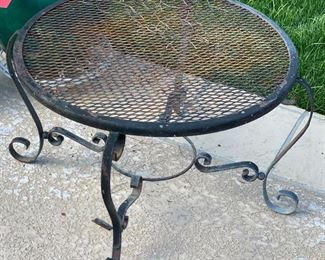 Vintage Wrought Iron Mesh Patio Table	16in H x 24in Diameter	
