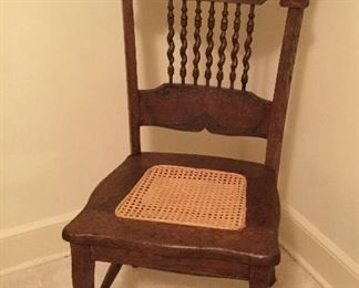 Antique pressed back oak chair.