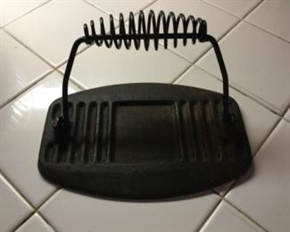 Antique cast iron bacon press.