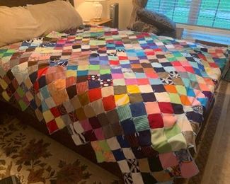 $75~ PATCHWORK  QUILT AS IS ONE SMALL SQUARE DETACHED  THISIS DISPLAYED ON A QUEEN BED 