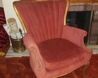 Pair of red wingback chairs with nailheads