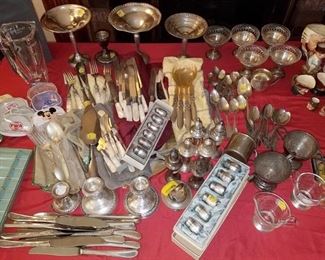 Sterling silver candlestick holders, spoons and more