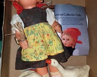 Vintage Hummel Collector doll. Also Hummel collector plate set with rack