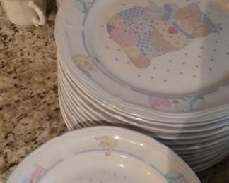 Cute cat pattern service for 12.  Sets include dinner plates, dessert plates, cups and saucers, and bowls.
