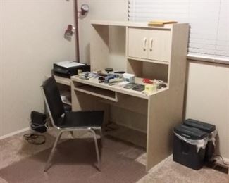 Computer desk, chair, shredders and office supplies.