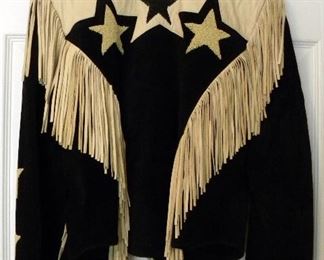 BACK OF DESIGNER JACKE WITH FRINDGE AND GOLD STARS