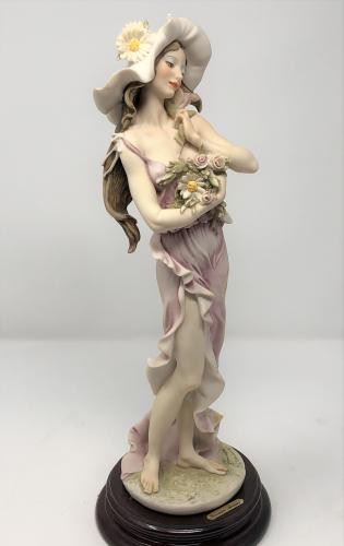  G Armani "Daisy" Figurine https://ctbids.com/#!/description/share/332203
