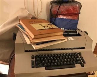 Typewriter with cover & supplies.