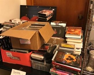 Lots of DVDs, VHS, cassettes & CDs.