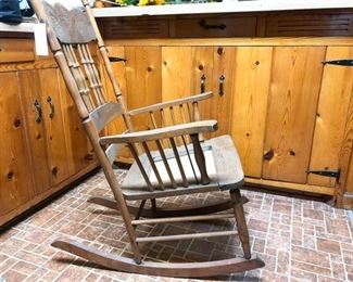 49. Antique Carved Rocking Chair