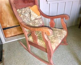 57. Upholstered Antique Rocking Chair