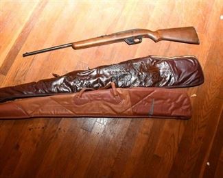 90. Winchester 22 Rifle and Cases