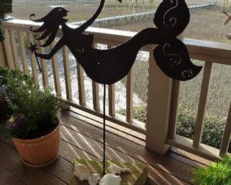 Metal mermaid art by artist Claudine Buehl