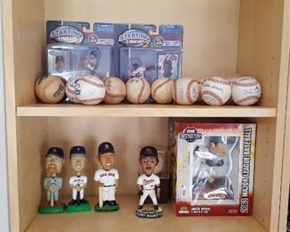 Bobble heads and baseballs with Autographs
