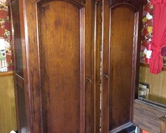 Huge antique armoire with drawers at bottom