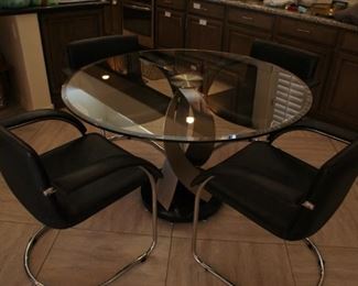 MODERN GLASS TABLE AND 4 CHAIRS