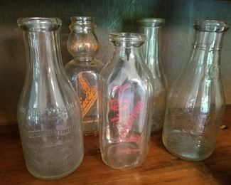Lot # 47 - $50 Five piece Vintage Milk Bottles