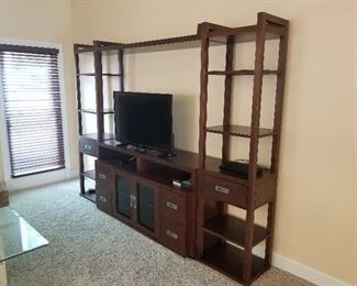 Lot # 58 - $225  Wall Unit (Four pieces)  8' 9" long  6' 8" tall X 19 1/2 " deep  (Unit is in excellent condition).