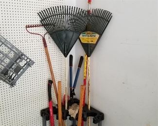 Lot # 234 - $50  Yard Tools and Storage Corner Rack 