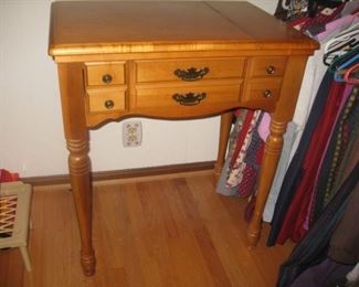 Singer sewing machine in cabinet