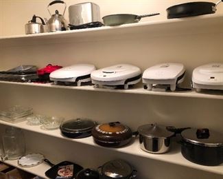Large selection of small appliances, pots pans, dishes, and glassware