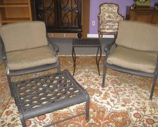 cast aluminum armchairs and ottoman