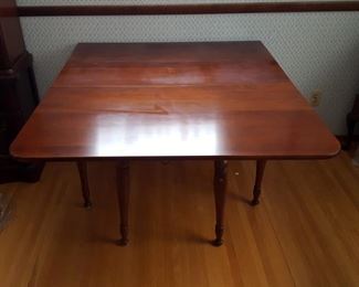 Cherry drop leaf table with leaf and pads