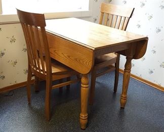 Small oak drop leaf table w/ 2 chairs