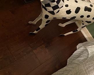 Large spotted dog with wagging tail good for inside or outdoors