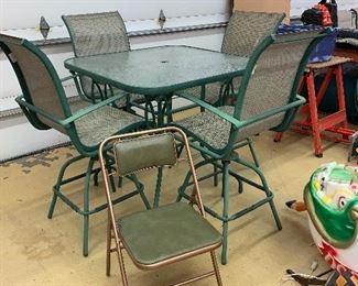 Spring will come- yes she will... and you'll be all set with this high top table and chairs! We also have a few table umbrellas!