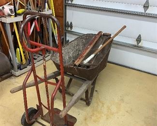 Talk about vintage... great wheelbarrow and tools! Darling planted with flowers & delightful as a party beverage caddy!