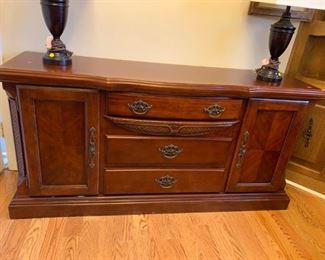 #20		Ashley side board w 3 drawers and 2 doors 60x17x30	 $175.00 
