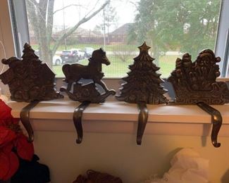 #40		(4) Set of 2 Rusticc  Heavy Cast Iron  Stocking Holders    $20
