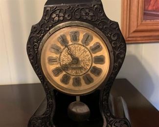 #77		Neuchatel electric shelf clock 10"	 $100.00 
