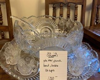 #84		Crystal punch bowl w/ 12 cups, ladle, platter (chipped)	 $100.00 
