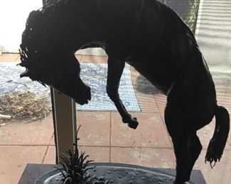 Welded metal “ Self Defense” by Gary Leddy   17” tall 