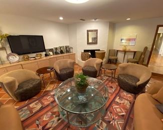 Two pairs of Weiman swivel chairs. 